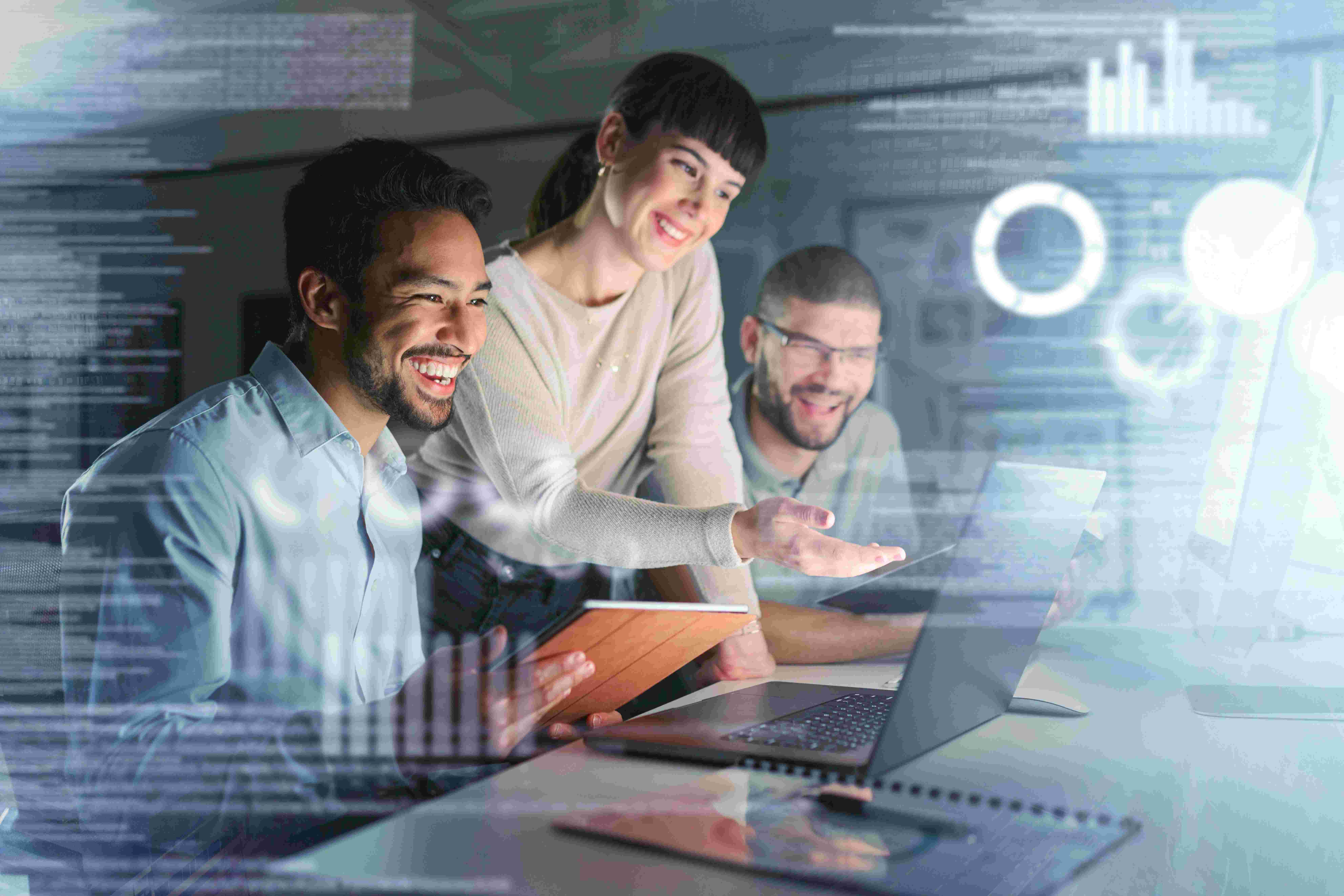 Three developers learning on a laptop