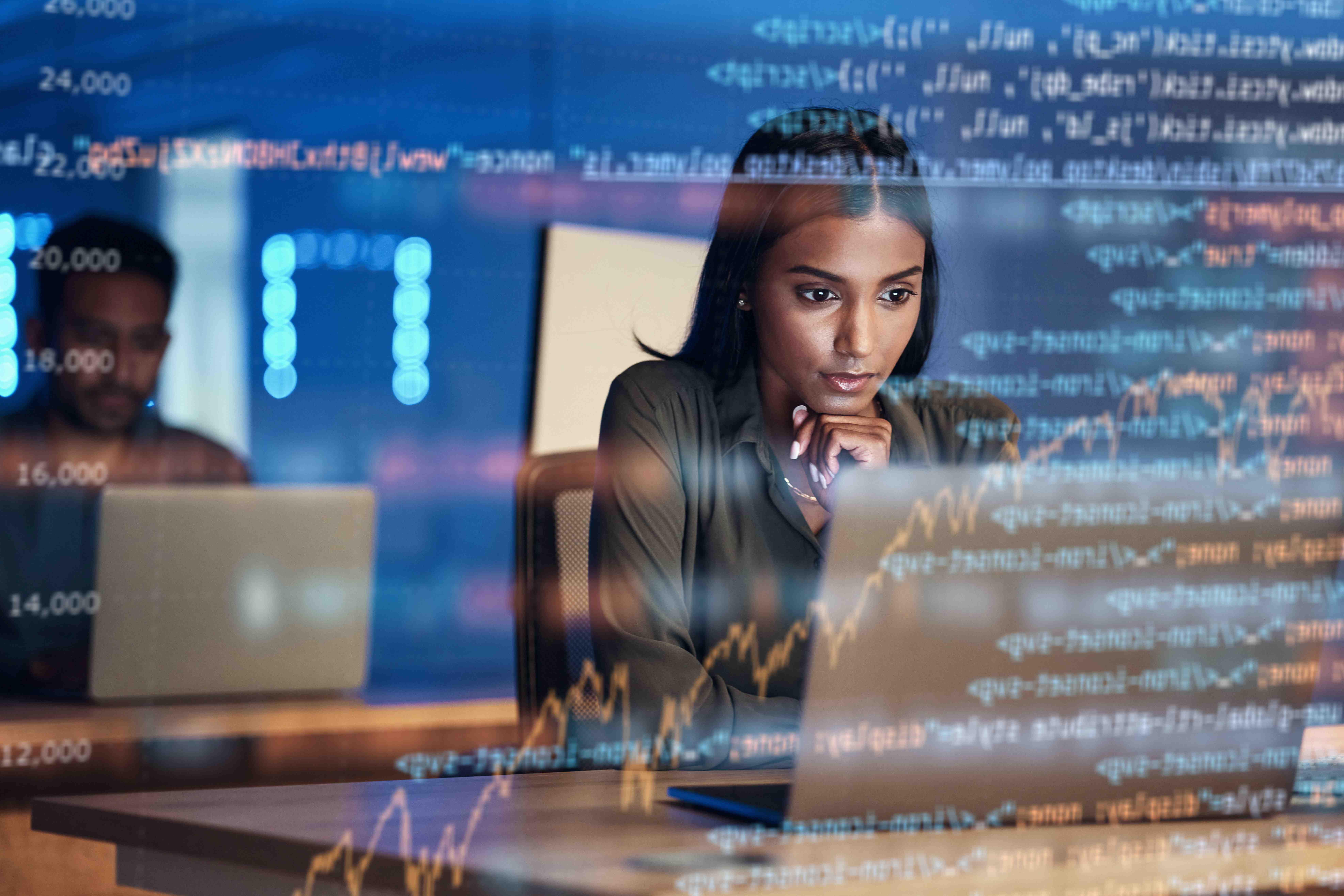 woman focusing on analyzing logs on computer for 5G